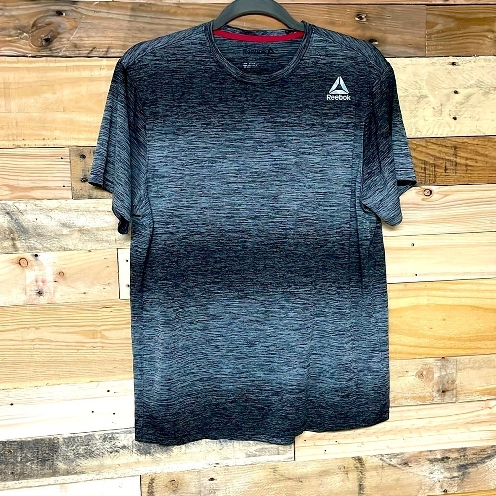 Reebok size medium gray and black short sleeve workout shirt dry wick